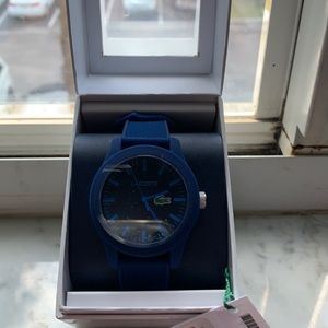 Men’s/ladies Lacoste watch